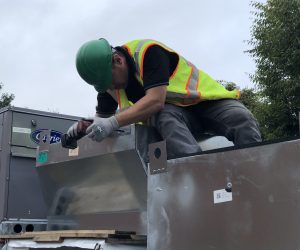 Team Mechanical - Technicians getting ready to install a new unit.